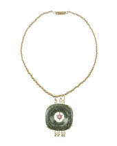 A WILLIAM SPRATLING 18K GOLD G