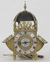 A wing-type brass lantern alar