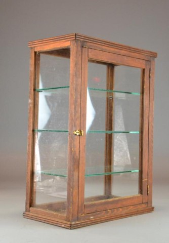 A Wood And Glass Table Display