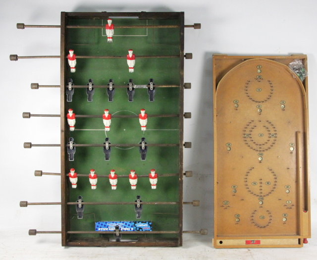 A wooden cased table-football pitch