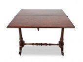 A WOODEN DINING TABLE, 19TH CE