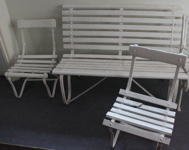 A wooden slatted garden seat and