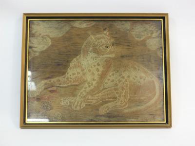 A woolwork picture of a leopard,