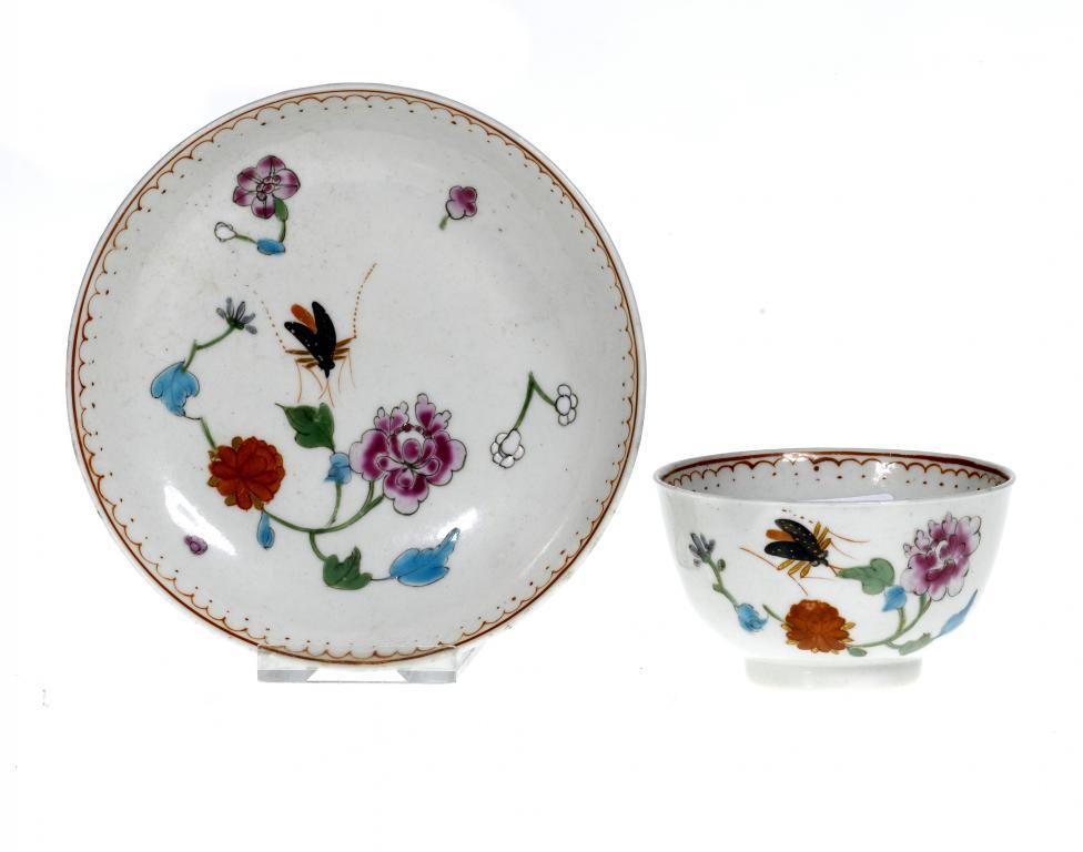 A WORCESTER TEA BOWL AND SAUCER