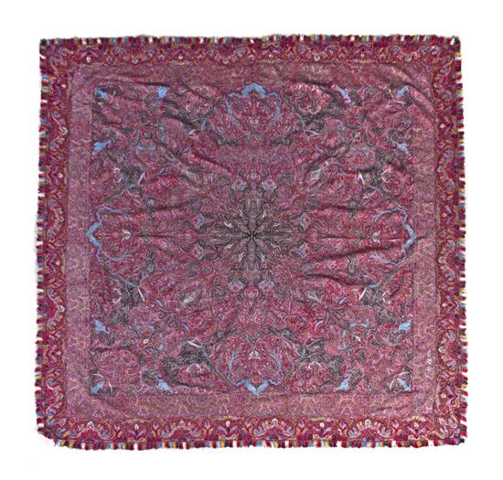 A Woven Paisley Shawl having a