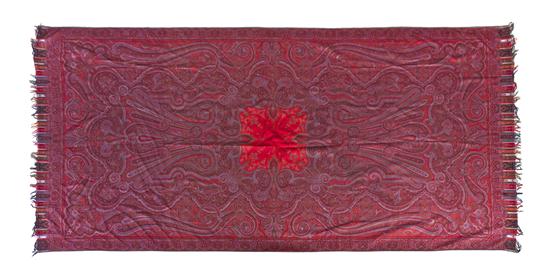 A Woven Paisley Shawl having a