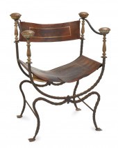 A WROUGHT IRON AND BRASS SAVON