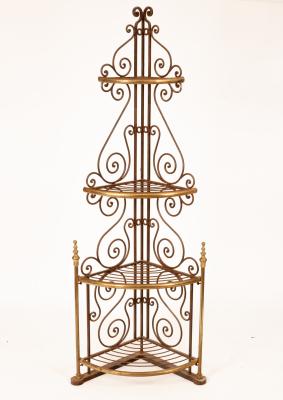 A wrought iron and brass