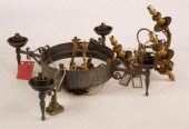 A wrought iron four-light elec