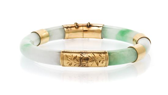 *A Yellow Gold and Jade Hinged