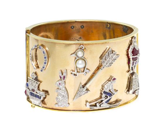 *A Yellow Gold Bangle Bracelet with