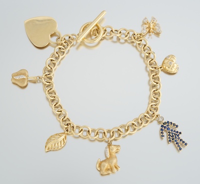 A Yellow Gold Charm Bracelet 14k