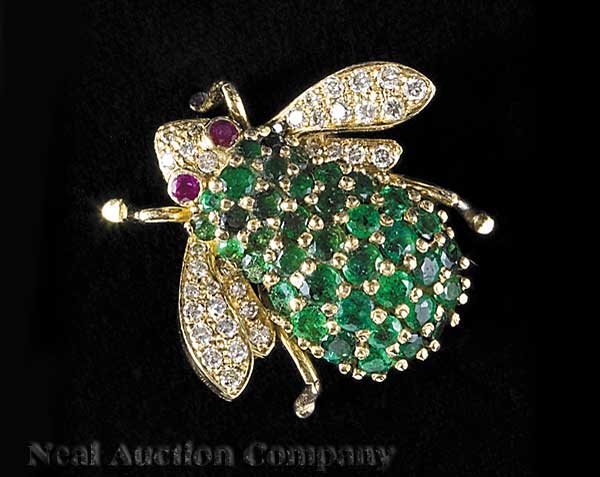A Yellow Gold Emerald Diamond and