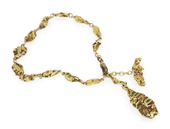 *A Yellow Gold Nugget Motif Watch