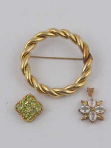 A yellow metal (tests 14 ct gold)