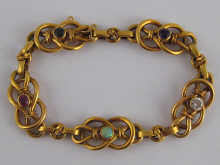 A yellow metal (tests 15 carat