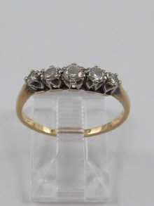 A yellow metal (tests 18 ct gold)