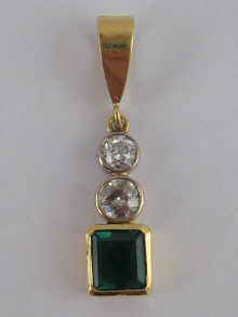 A yellow metal (tests 18 carat