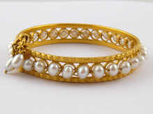 A yellow metal (tests 18 carat