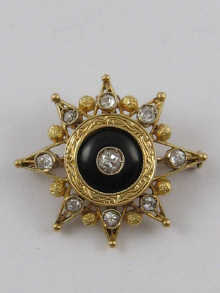 A yellow metal (tests 18 ct gold)