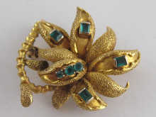 A yellow metal (tests 18 carat
