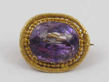 A yellow metal (tests 18 ct gold)