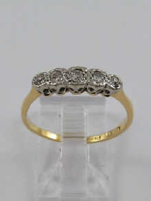 A yellow metal (tests 18 ct gold)