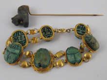 A yellow metal (tests 18 carat