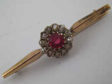 A yellow metal (tests 18 carat