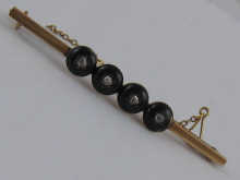 A yellow metal (tests 18 carat