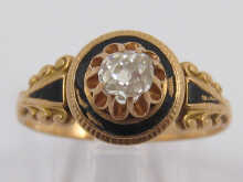 A yellow metal (tests 18 carat