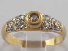A yellow metal (tests 18 carat
