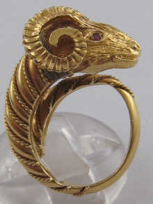 A yellow metal (tests 18 carat