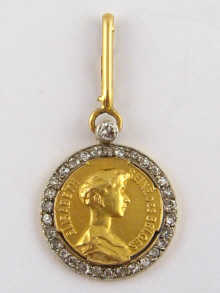 A yellow metal (tests high carat