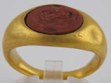 A yellow metal (tests high carat