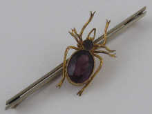 A yellow metal (tests silver