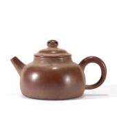 A YIXING GLAZED ZISHA TEAPOT<b