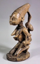 A Yoruba Maternity Fetish Figu
