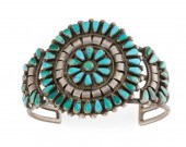 A ZUNI SILVER AND TURQUOISE CL