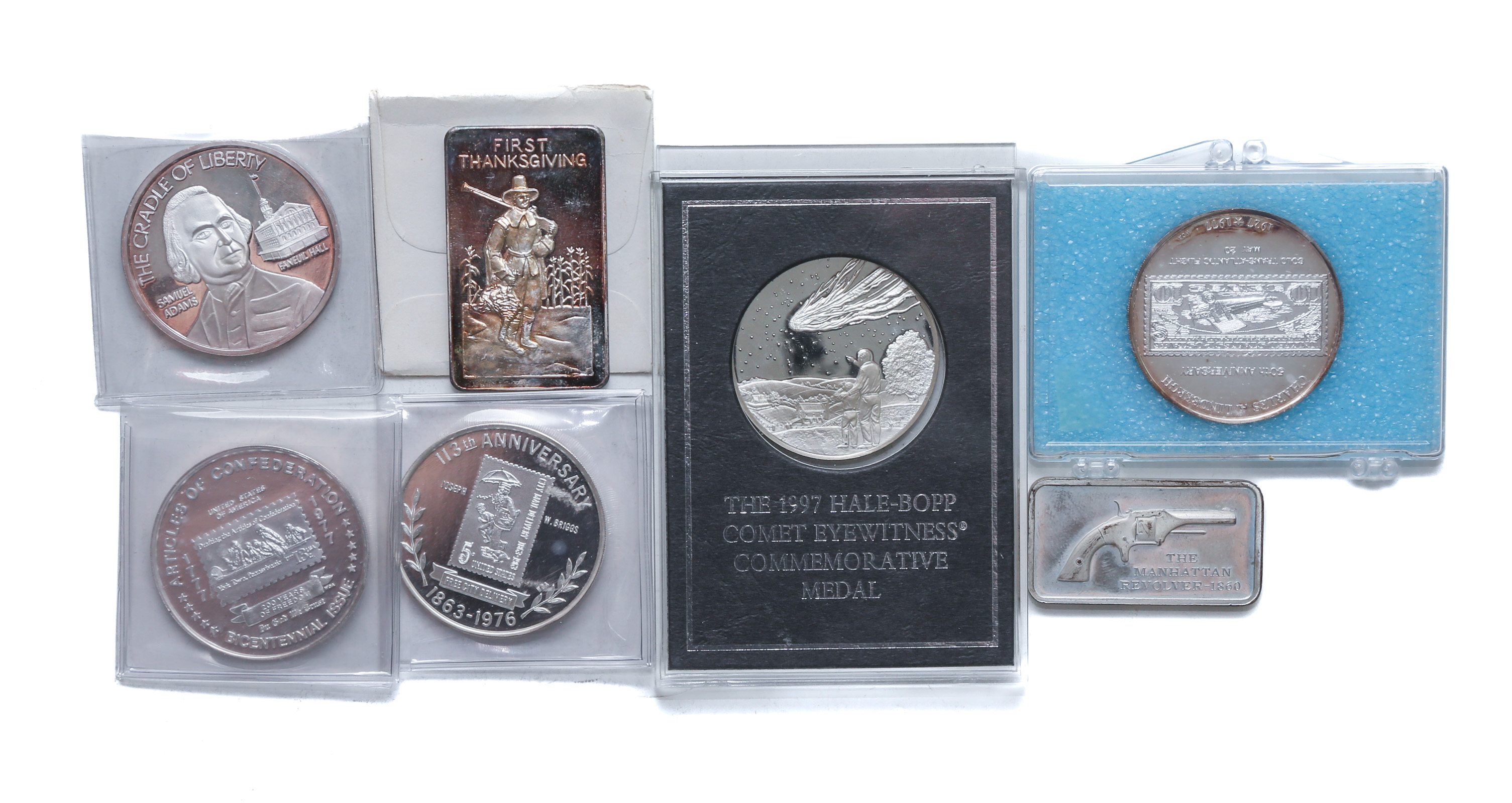 ABOUT 7 OUNCES SILVER IN ROUNDS,