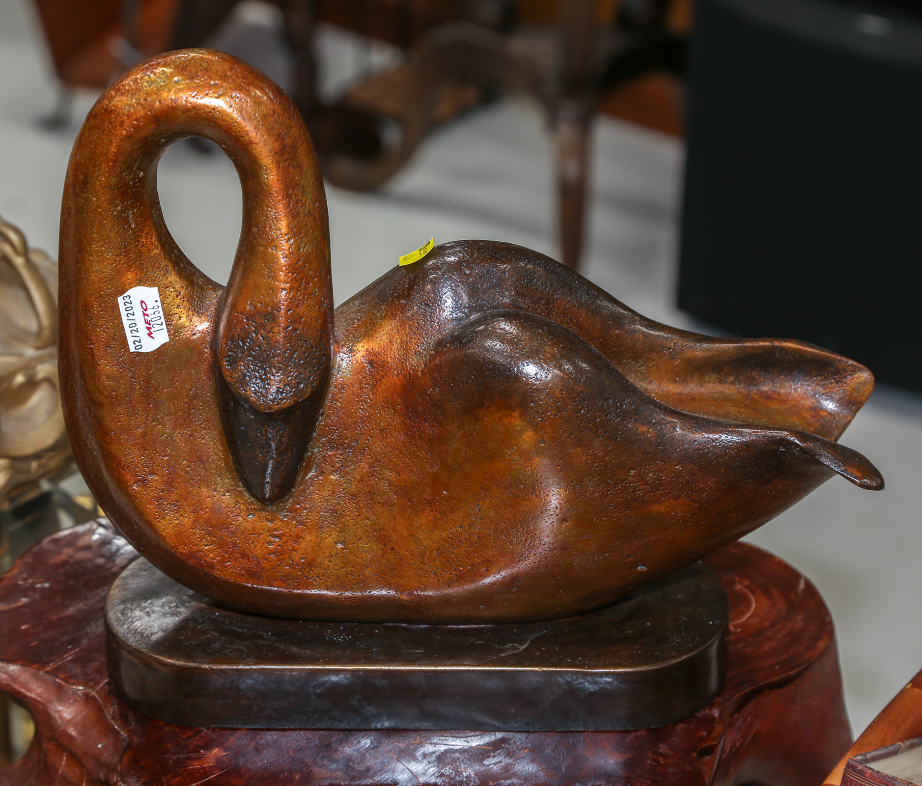 ABSTRACT BRONZE SCULPTURE OF A