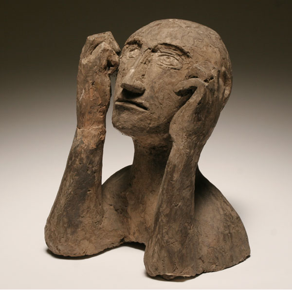 Abstract plaster head sculpture;