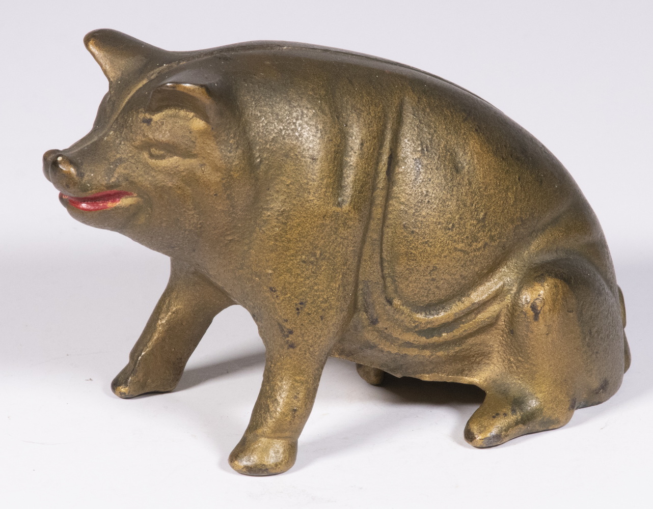 A.C. WILLIAMS SEATED PIG STILL BANK