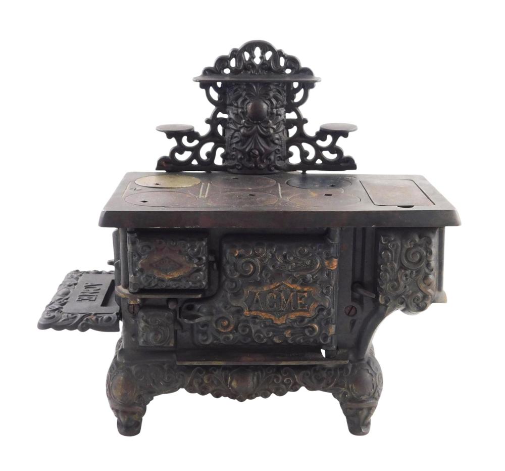 ACME CAST IRON TOY STOVE,