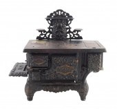 ACME CAST IRON TOY STOVE, NON-
