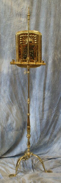 Adjustable polished brass candle