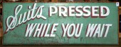 ADVERTISING SIGN, READING "SUI