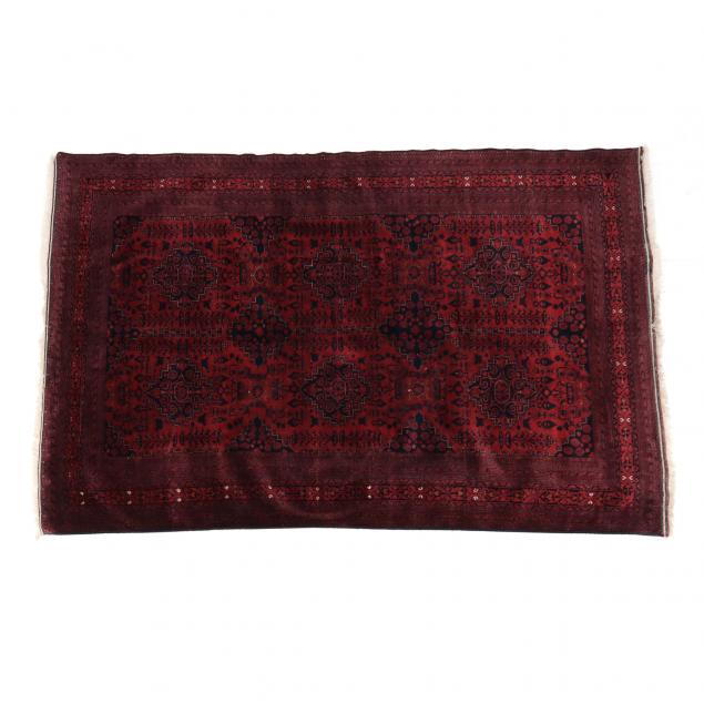 AFGHAN AREA RUG Dark red field with