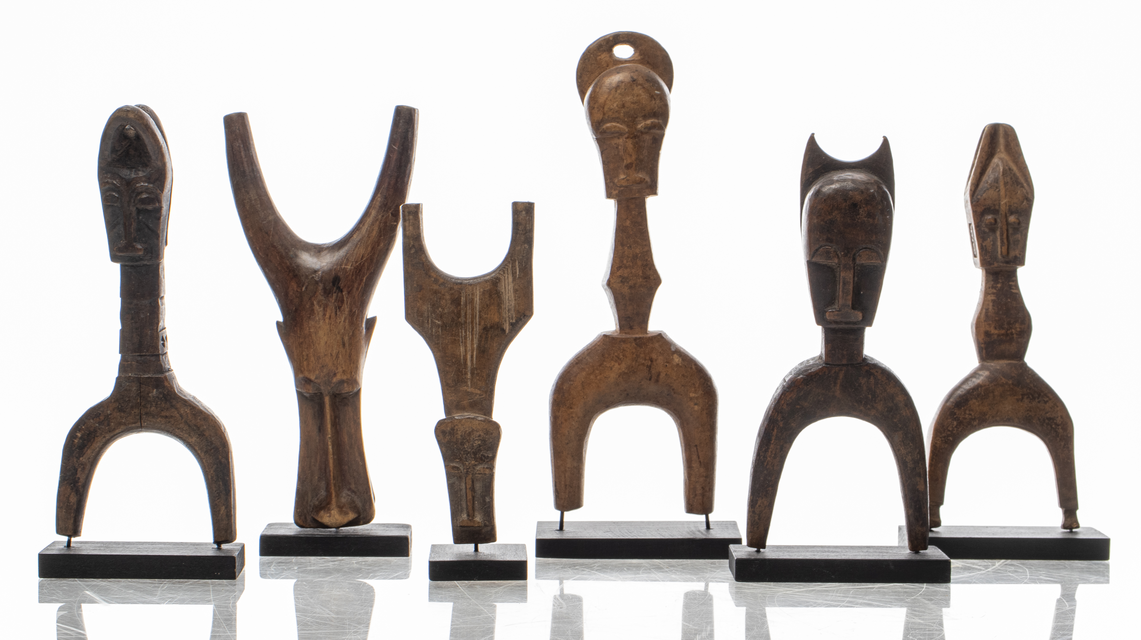 AFRICAN BAULE CARVED SLINGSHOTS,