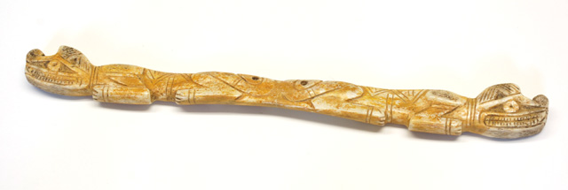 AFRICAN BONE CARVING depicting a